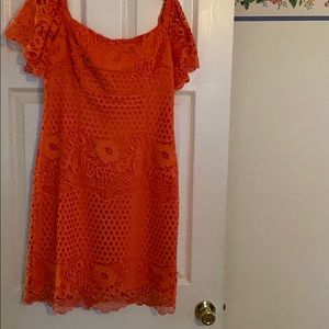 Beautiful peach lace dress .